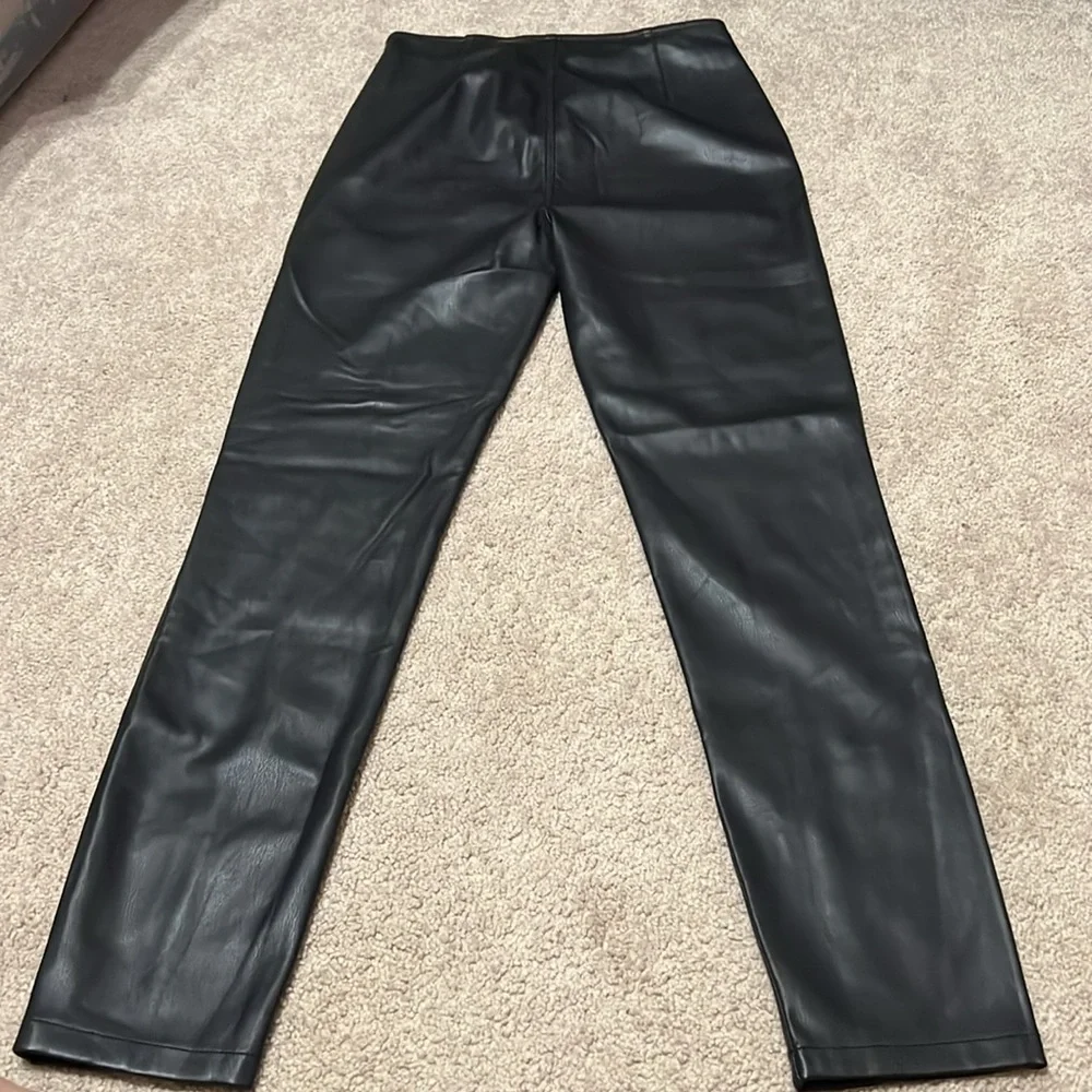 NWT FREE PEOPLE black coated pants Size 27